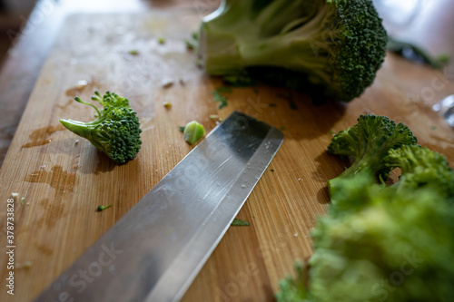 Broccoli in the Chop-board with a knife photo