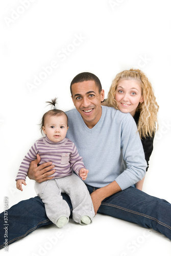 Multiracial family. Dad, mom and baby girl