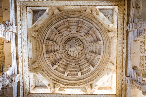 Beautiful carved white marble ceiling in Ranakpur Jain temple in Rajasthan, India. This is one of the largest and most important temples of Jain culture.