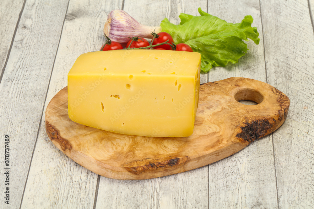 Hard yellow tasty cheese brick Hard yellow tasty cheese brick