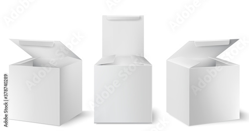 Set of three white boxes with opened lids positioned at different angles. Rea...