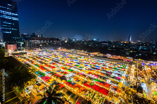 colored night market at night at Bangkok thailand with long expsoure, panorama