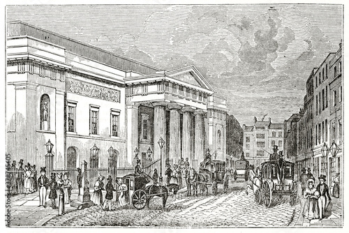 Canvas Print Old outdoor view of Covent Garden theater, London, in a busy street with people and carriages