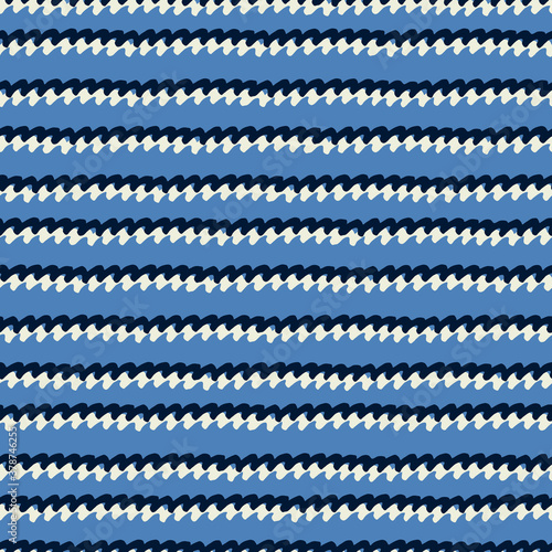 Seamless repeating pattern with hand drawn wavy double lines on blue background for surface design and other design projects