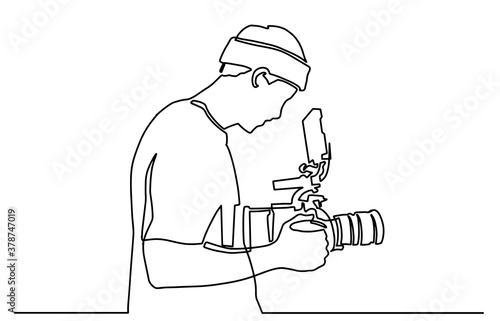 Young tourist man photographer with a camera takes pictures. One line drawing isolated vector object by hand on a white background. Continuous single drawn one line operator with camera