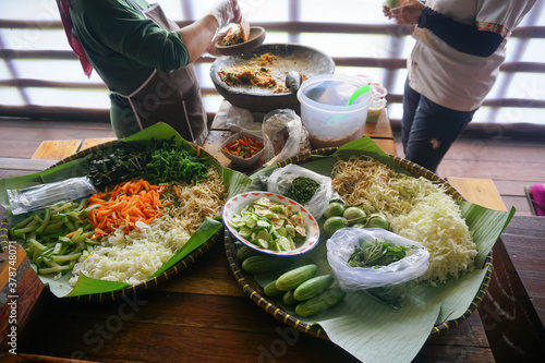 Pecel and Karedog sellers in traditional markets. Typical food from Indonesia. photo