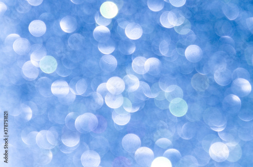 blue abstract bokeh background, creative design. holiday decoration.