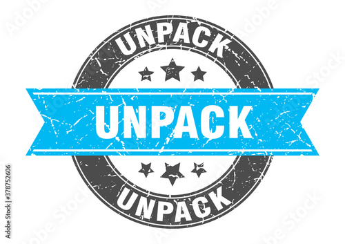 unpack round stamp with ribbon. label sign