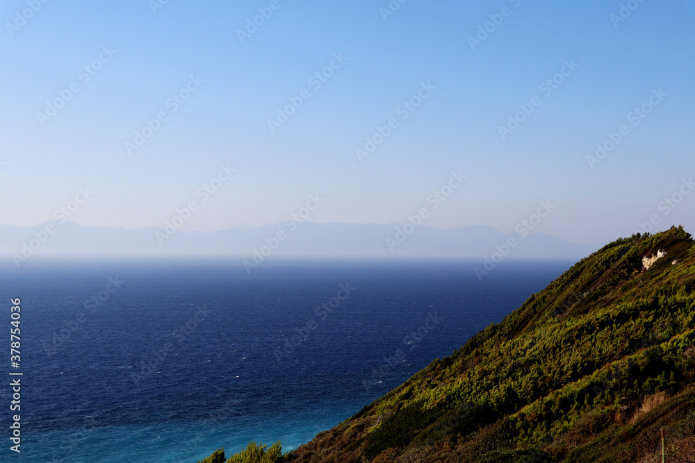 Mountains with sea view and clear blue sky