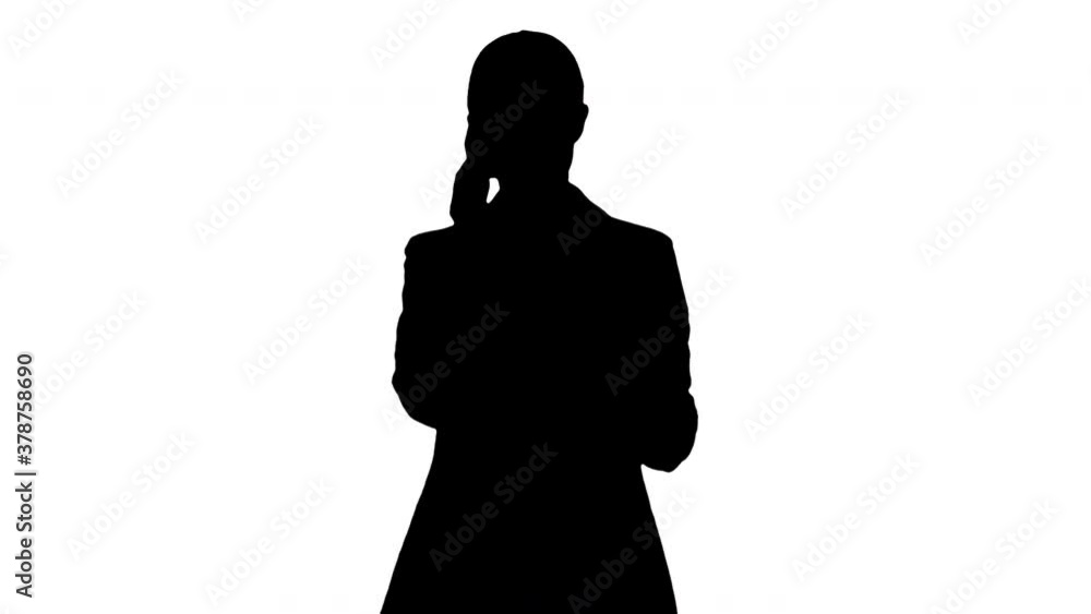 Silhouette Bossy Businesswoman talking on her phone. Silhouette Bossy Businesswoman talking on her phone.