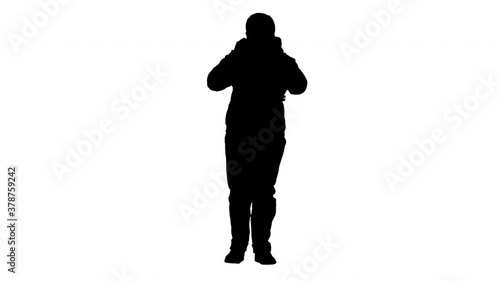 Silhouette Cool teenager boy in casual clothes wearing medical mask. photo