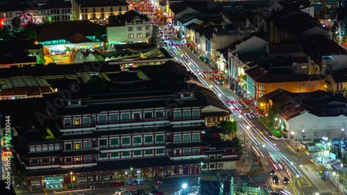 night time illuminated singapore city center famous china town temple traffic rooftop timelapse panorama 4k  photo