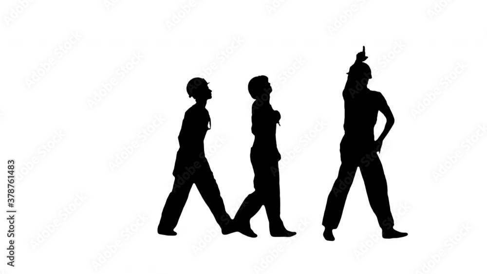 Silhouette Three young construction workers doing a funny row dance touching their hardhats and pointing fingers. Silhouette Three young construction workers doing a funny row dance touching their hardhats and pointing fingers.