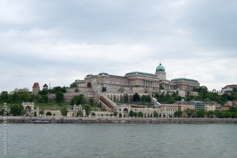 The panoramic cityscape of the historical Buda castle, the old architecture of the Buda hill and the Danube river in Budapest, Hungary