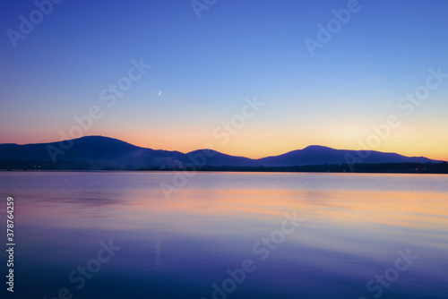 colorfull calm lake at sunset