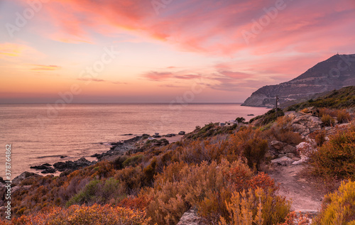 Sunset on the north western coast of the Mediterranean island of Corsica, France.