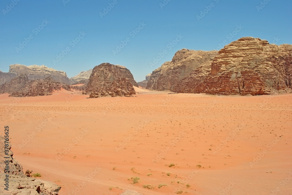 Sandstone rocks and sand in Wadi Rum desert, Jordan Sandstone rocks and sand in Wadi Rum desert, Jordan