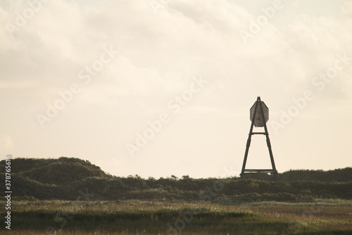  The beacon on Amelend, A cape or sea cape is a beacon for shipping and is a striking landmark in the landscape. on the beautiful Oerd, protected nature area on Ameland, the Netherlands