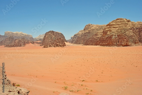 Sandstone rocks and sand in Wadi Rum desert, Jordan