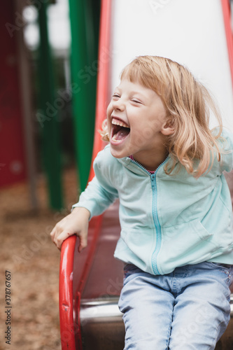 Portrait of charming, lovely disabled blond girl.