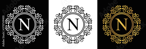  Gold letter  N Vintage set black, white and golden flower ornament initial letters.  Alphabet. Logo vector 