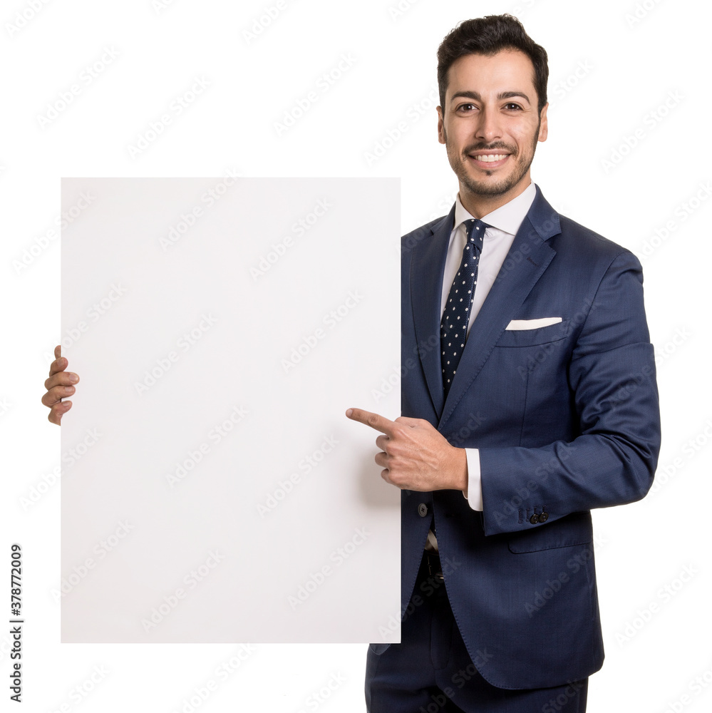 Portrait of a happy smiling business man holding and point to a blank background Portrait of a happy smiling business man holding and point to a blank background