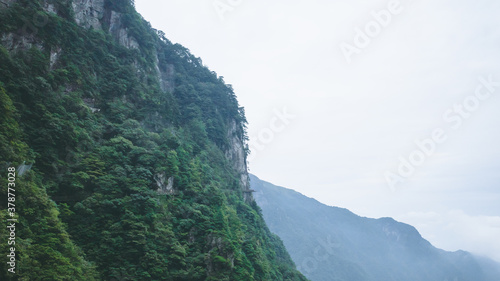 Mountain landscape covered in clouds and fog on Wugong Mountain in Jiangxi, China © Mark Zhu