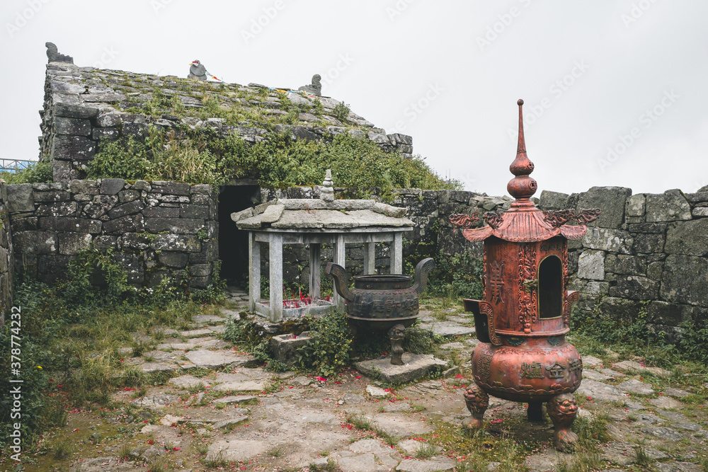 Abandoned altar complex with incense burners on Wugong Mountain in Jiangxi, China