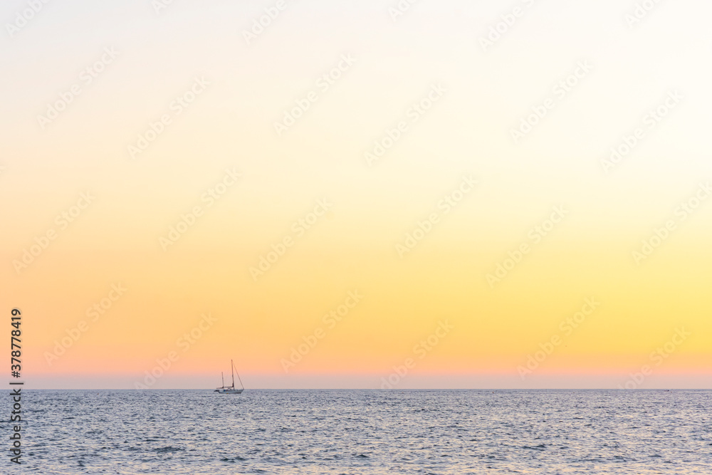 Lone Yacht on the Ocean at Sunset - Bantham, Devon, England