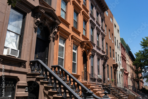 Row of Old Brownstone Homes in Bedford-Stuyvesant in Brooklyn of New York City with Staircases