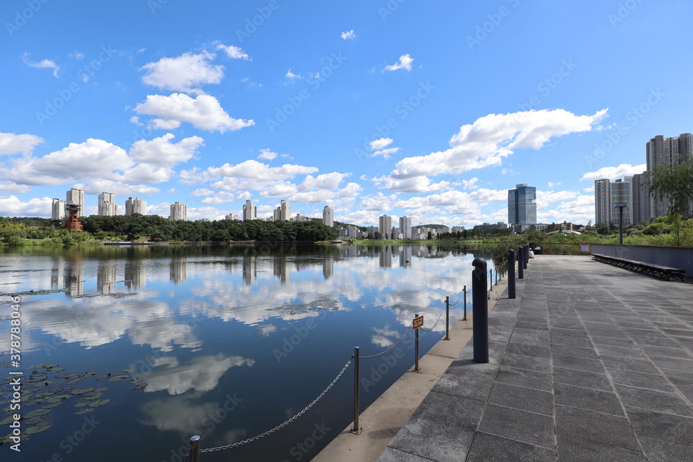 A photo of a park lake and sky.
