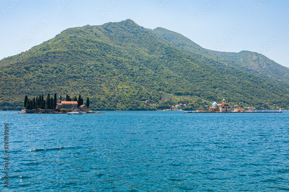 Fototapeta premium View to The Island of Saint George and Our Lady of the Rocks islet, Perast, Bay of Kotor, Montenegro
