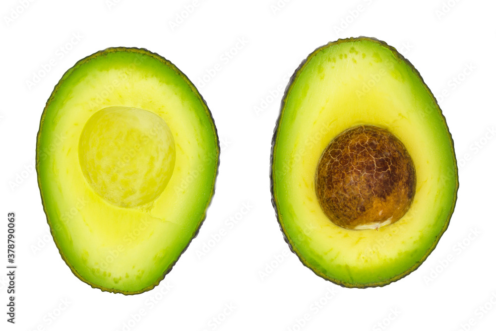 sliced avocado isolated on white. 2 halves of ripe green avocado with core