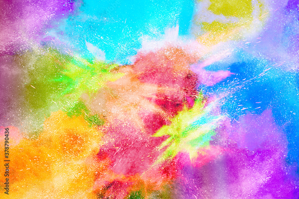 Freeze motion of colorful color powder exploding on white background. 