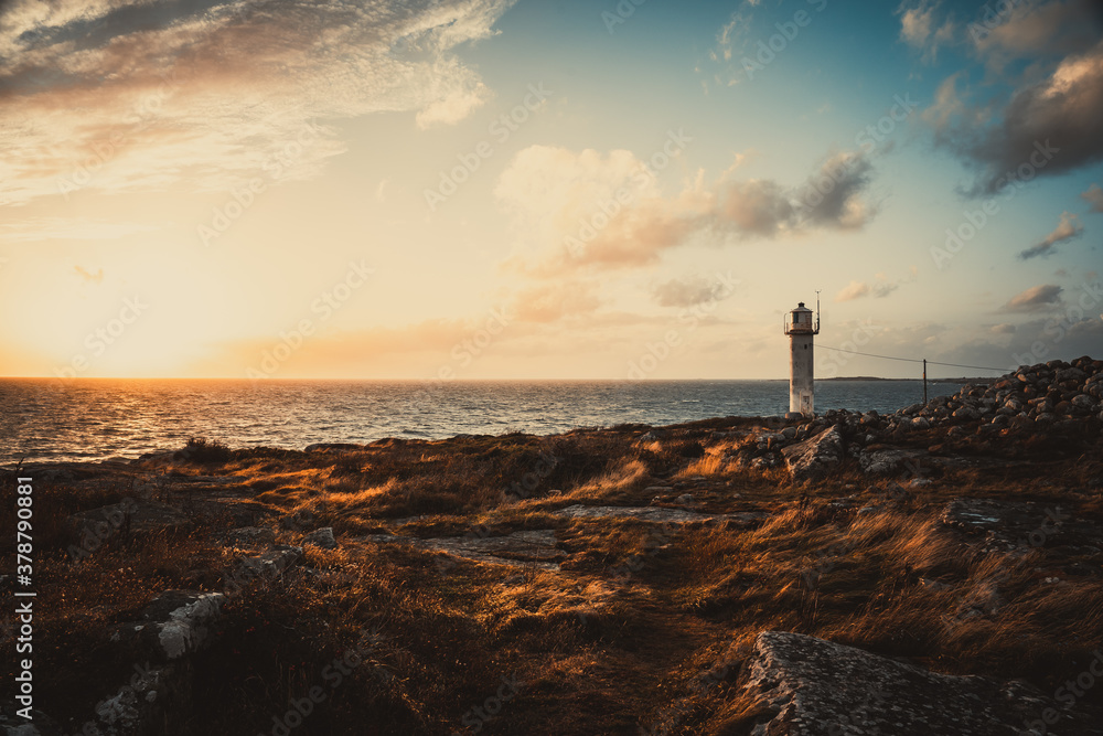 Lighthouse during golden sunset on the Swedish west coast Varberg.