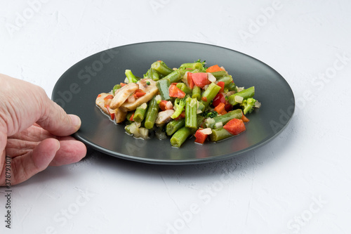 Sauteed vegetables, on white background. In study