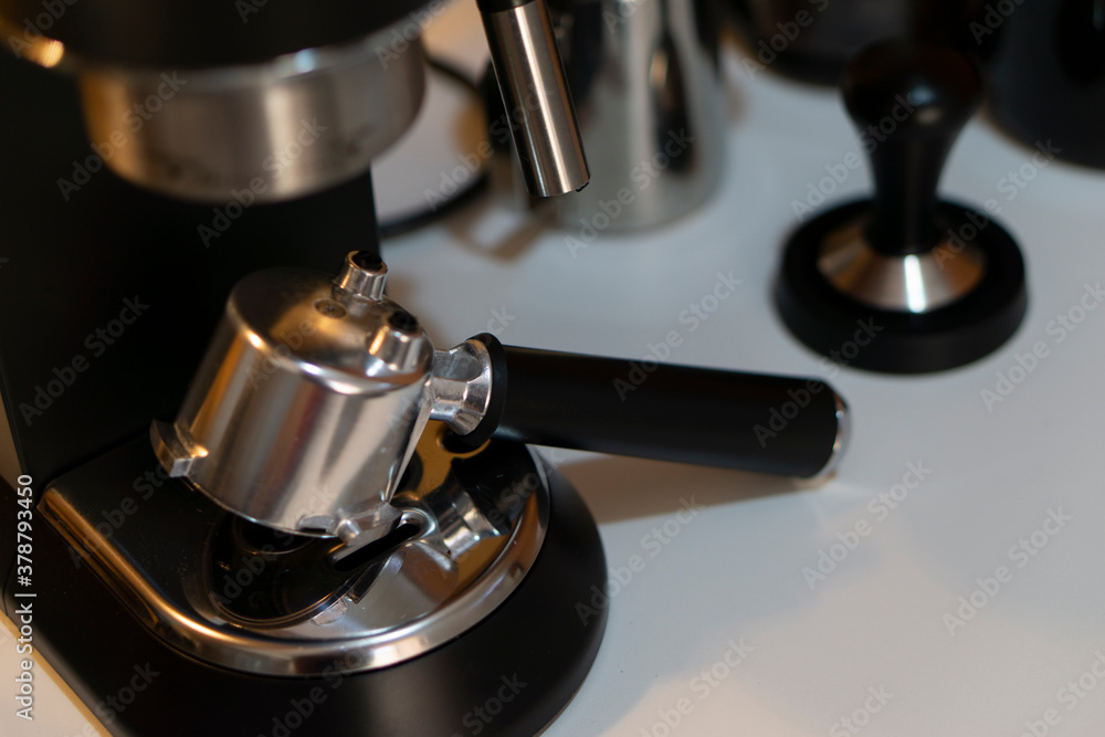 Professional coffee machine making espresso in a cafe Professional coffee machine making espresso in a cafe