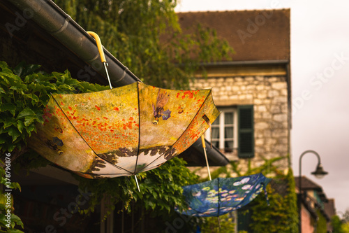 Umbrellas with paintings, Clode Monet photo