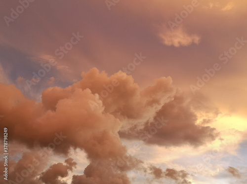 sky sunset golden color background of evening with sunlight coming through clouds view before sunset and good atmosphere