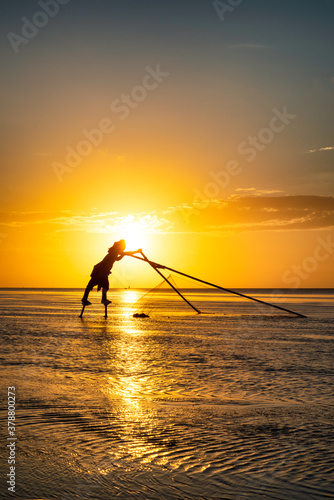 Shadow fishermen in the early morning.