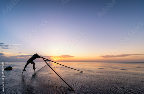 Shadow fishermen in the early morning.