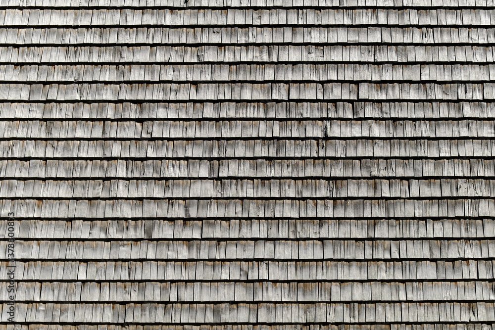 The wooden wall of the building. The pattern of wooden wall.