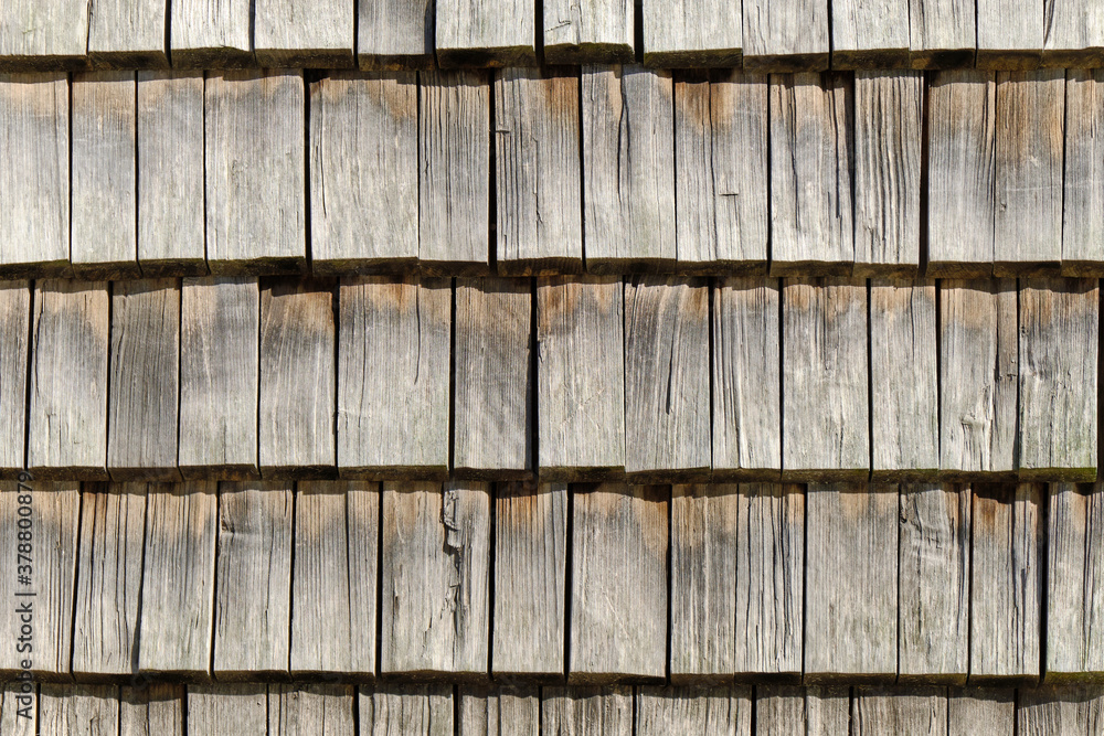 The wooden wall of the building. The pattern of wooden wall.