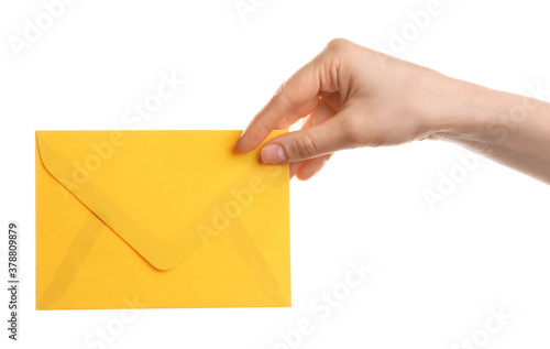 Woman holding yellow paper envelope on white background, closeup