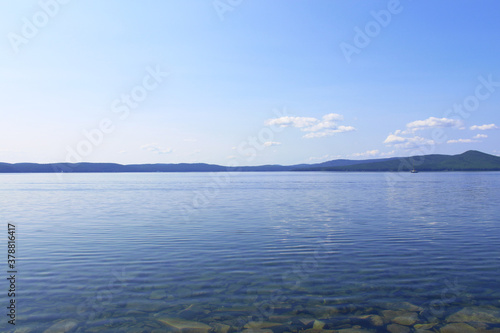 Wonderful view of the lake and mountains. Background. Landscape.