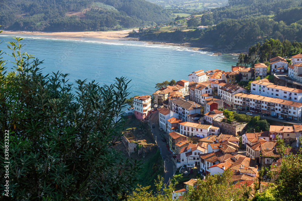 Fishing and tourist town on the coast of Asturias with terraced buildings. Lastres. North of Spain
