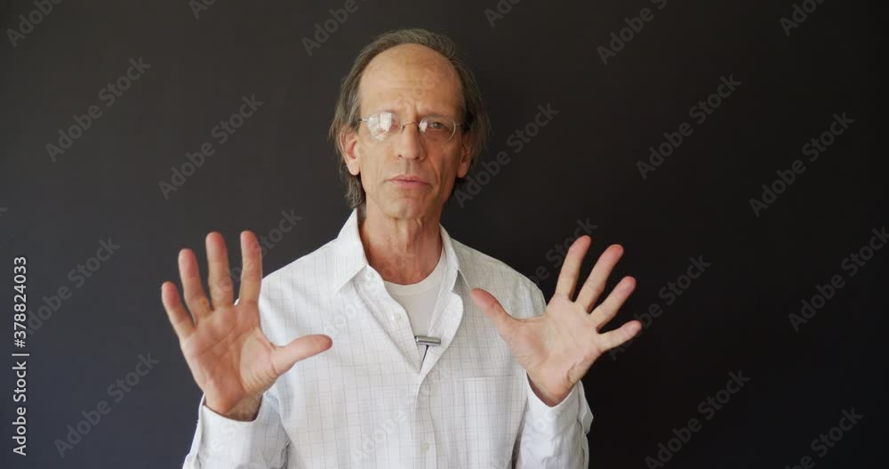A college professor teaching remote learning online classes to school students on a video chat webcam. A college professor teaching remote learning online classes to school students on a video chat webcam.