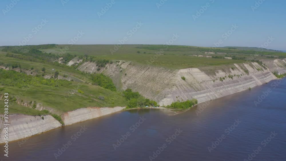 Steep bank of the river from a bird's eye view. Bank of the Volga River in Russia. Aero 4k Steep bank of the river from a bird's eye view. Bank of the Volga River in Russia. Aero 4k