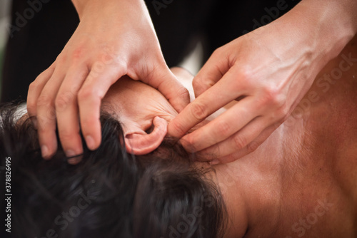 Professional facial massage to tighten and elasticize the skin © alipko