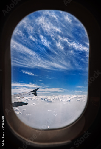 Beautiful aerial view of sky from tha plane of window.